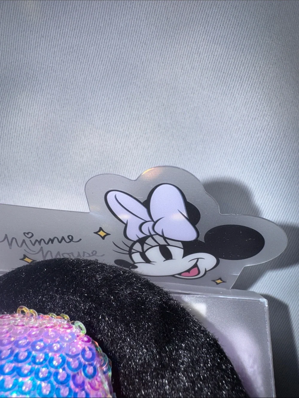 Disney/The Crème Shop Iridescent Pink/ Lavender Sequin Bow Minnie Ears Headband